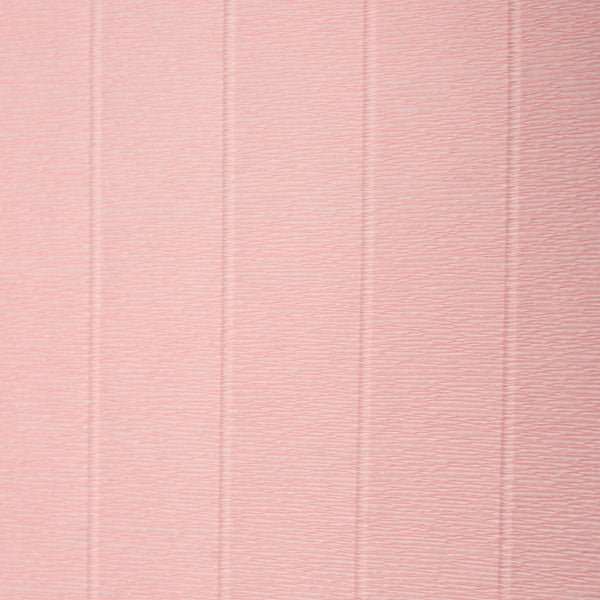 A sheet of crepe paper in camilia pink with visible texture.